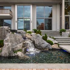 Contemporary Home With Nature-Inspired Waterfall