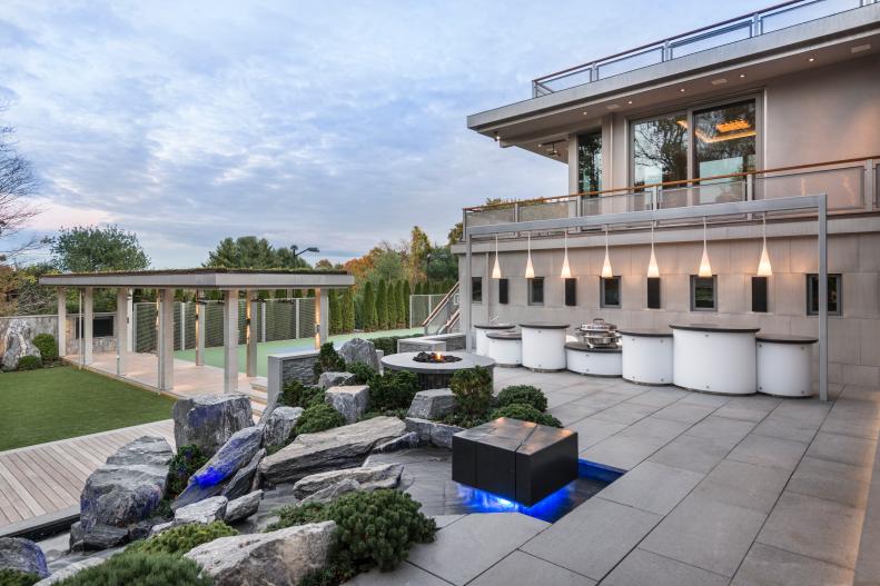 Contemporary Outdoor Living Space With Water Feature