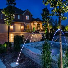 Front Entrance Water Feature With Four Waterfall Spouts and Raised Planter 