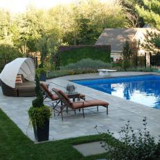 Backyard With Pool and Lounge Chairs