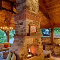 Natural Rock Chimney in Covered Outdoor Living Space 