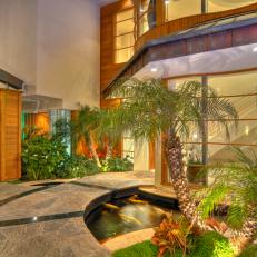 Entry to Beach Home Mixes Tropical and Contemporary Styles