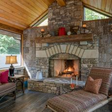 Rustic Stone Fireplace and Chaise