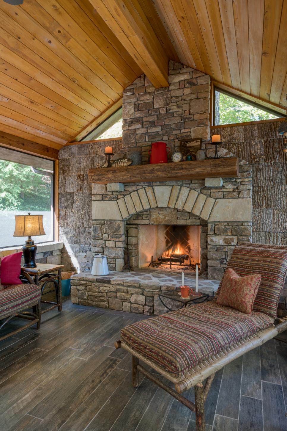 Rustic Stone Fireplace and Chaise | HGTV