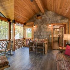 Rustic Screened-In Family Room Porch With Sofa