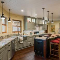 White and Green Country Kitchen With Red Barstools