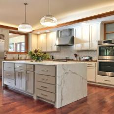 Neutral Contemporary Chef Kitchen With Marble Island