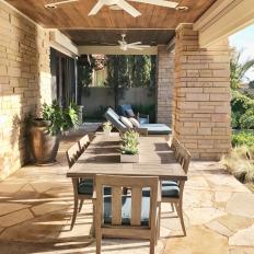 Porch With Ceiling Fans and Table