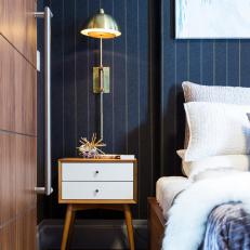 Nightstand and Brass Sconce