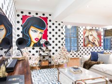 Modern living room with polka dot wallpaper.