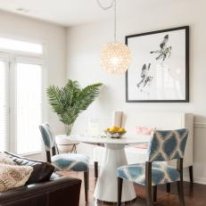 Contemporary Dining Area With Patterned Chairs