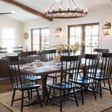 Open Concept Dining Room With Black Wooden Dining Set