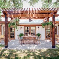 Inviting Outdoor Patio With Dining Area and Large Pergola