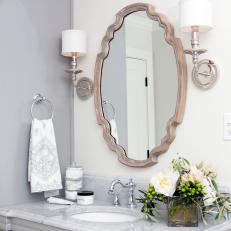 Master Bathroom Vanity With Decorative Metallic Framed Mirror