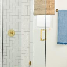 Crisp White Tiled Shower in Contemporary Bathroom