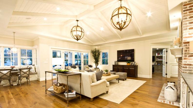Traditional Living Room With Globe Light Fixtures, Hardwood Floor