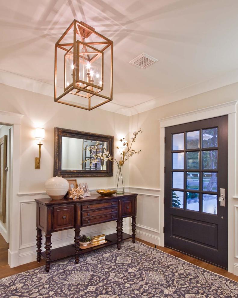 Neutral Traditional Foyer With Gold Light Fixture, Wood Console