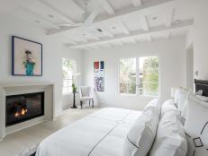 White Bedroom With Fireplace