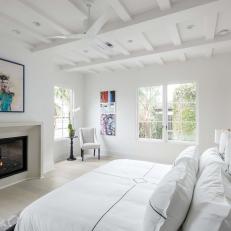 White Contemporary Bedroom With Fireplace