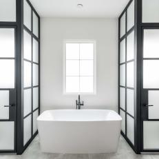Black and White Modern Bathroom With Soaking Tub