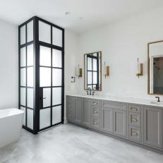 Gray Modern Bathroom With Gold Mirrors