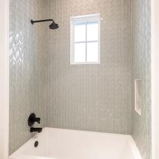 Bathtub With Gray Tile Backsplash