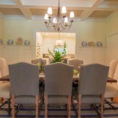 Contemporary Yellow Dining Room with Chandelier