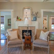 Neutral Cottage-style Foyer with Stone Fireplace