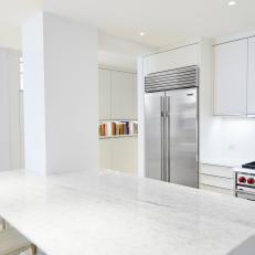 White Open Kitchen With Marble Counter
