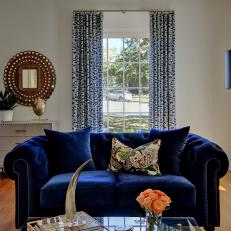 Blue and White Transitional Living Room With Blue Sofa