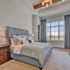 Gray and White Transitional Bedroom With Upholstered Bed