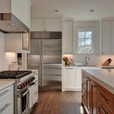 White Transitional Kitchen With Wood Island