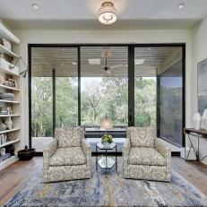 Neutral Transitional Library With Twin Armchairs