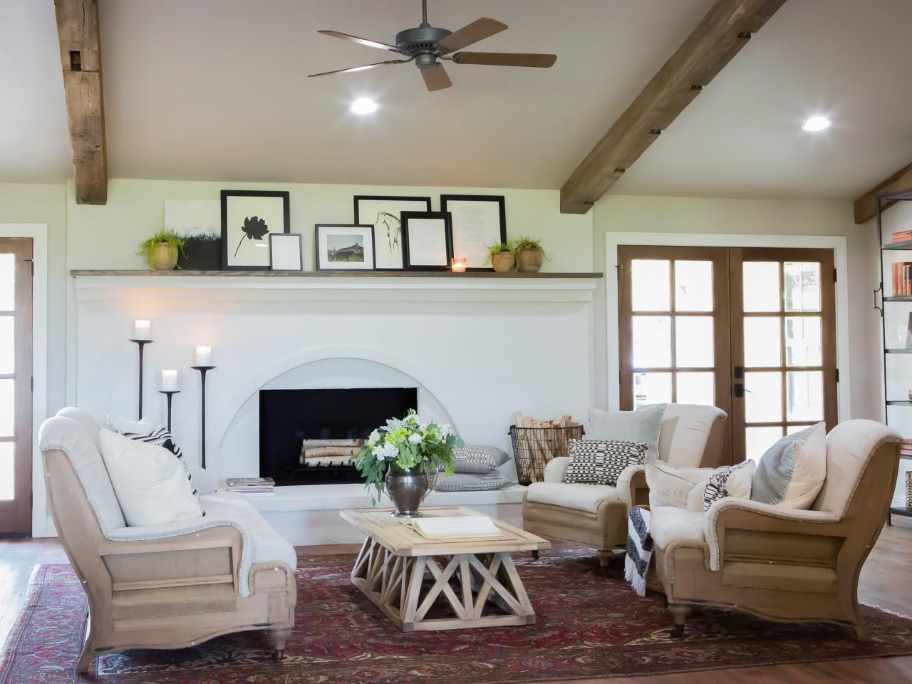 Renovated Living Room With Reclaimed Wood Ceiling Beams Hgtv