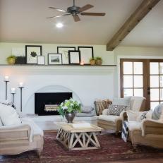 Renovated Living Room With Reclaimed-Wood Ceiling Beams