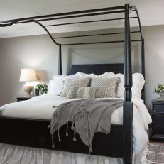 Master Bedroom With Black Four Post Bed