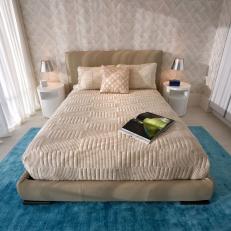 Neutral Contemporary Bedroom With Blue Rug