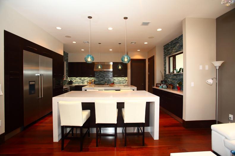 White Contemporary Kitchen With Two Islands, Hardwood Floor