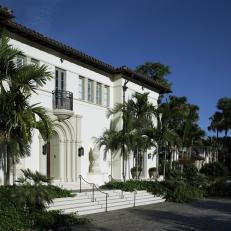 Exterior: White Mansion With Palm Trees