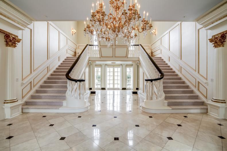 Traditional Foyer With Double Staircase