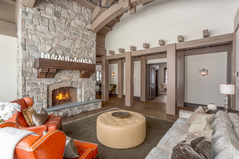 Rustic Living Room With Stacked Stone Fireplace