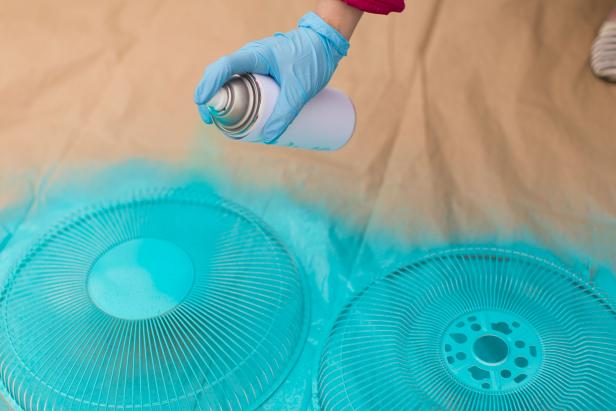 Spray paint the fan cover and blades with a bright color of your choice.