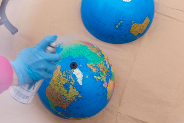 Spray Painting Primer on Globe