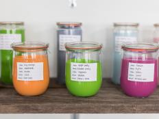 Leftover Paint in Labeled Glass Jars