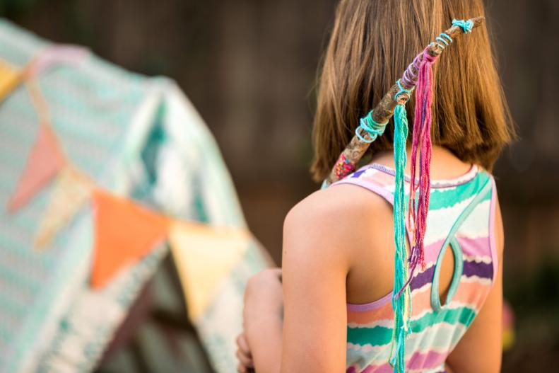 Let kids create their own journey sticks using colorful paints, yarns and tapes. As they find interesting and inspiring items like feathers, flowers and rocks, they can tie it to their stick to help document their adventures.