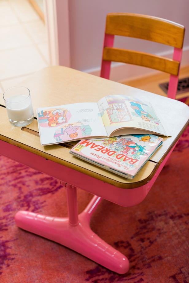 GIVE LITTLE KIDS A SPACE TO WORK
Add style for pint-sized family members with a vintage school desk. This gives kids designated spots in the office to focus on their ABCs and 123s.