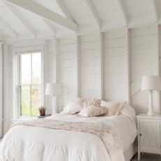 All-White Bedroom With Exposed Beams