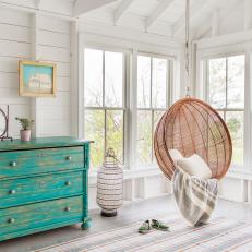 Reading Nook With Vintage Blue Drawer and Hanging Egg Chair
