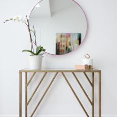 Hot Pink Mirror Adds Pop of Color to Entryway