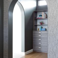 Gray Half Wall Separates Master Bedroom from Bathroom Space